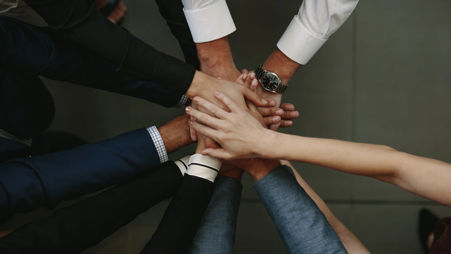 group of people holding hands